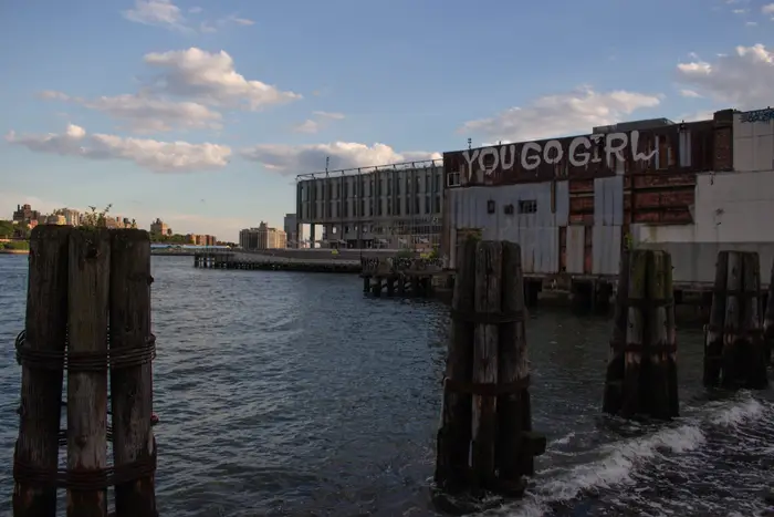 A photo of "You Go Girl" graffiti by the South Street Seaport
